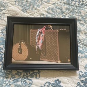 A super cute Louis Vuitton luggage picture wall art